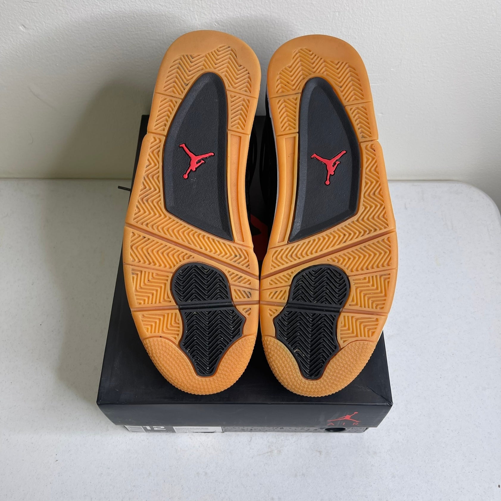 Jordan 4 Retro Laser Black Gum